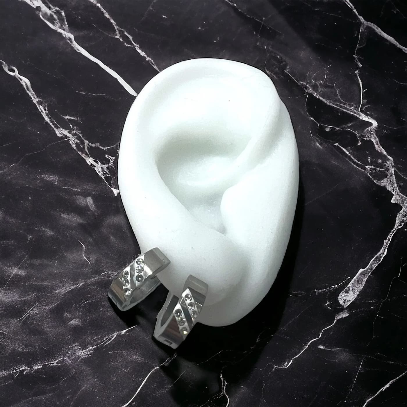 Aritos de plata con joyas