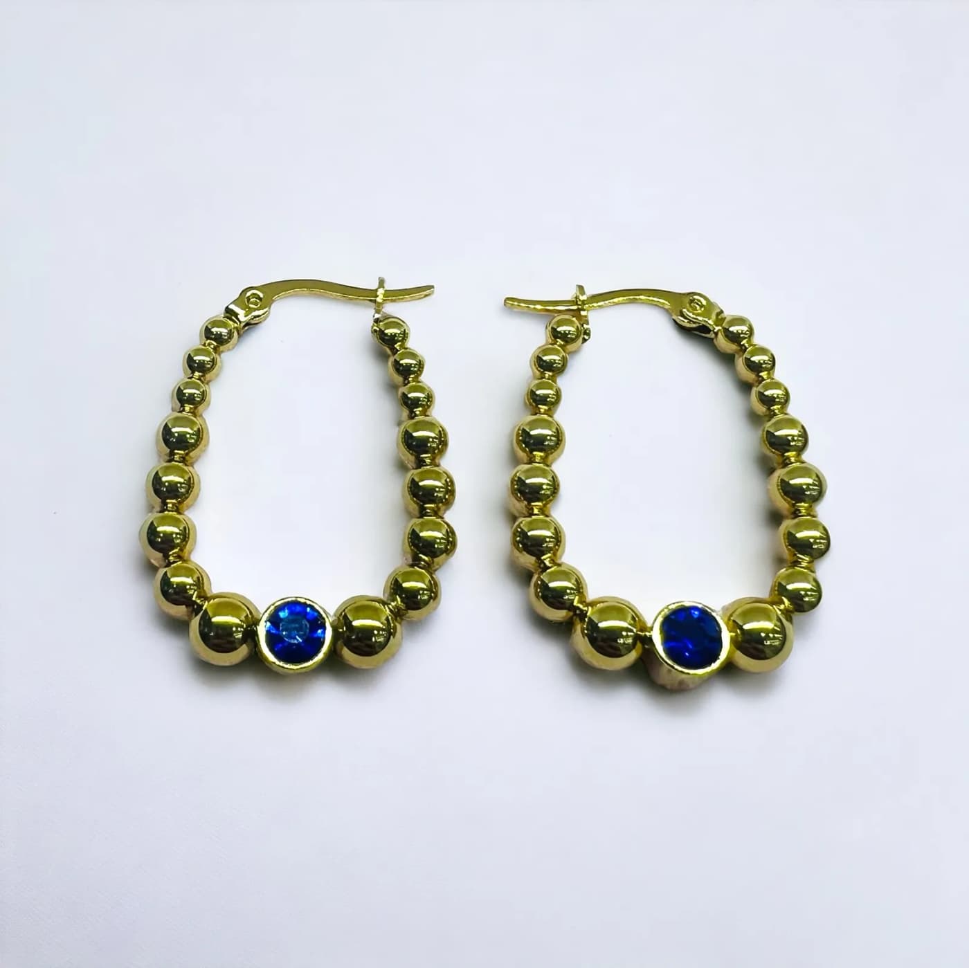 Aritos dorado con joya azul (30mm)