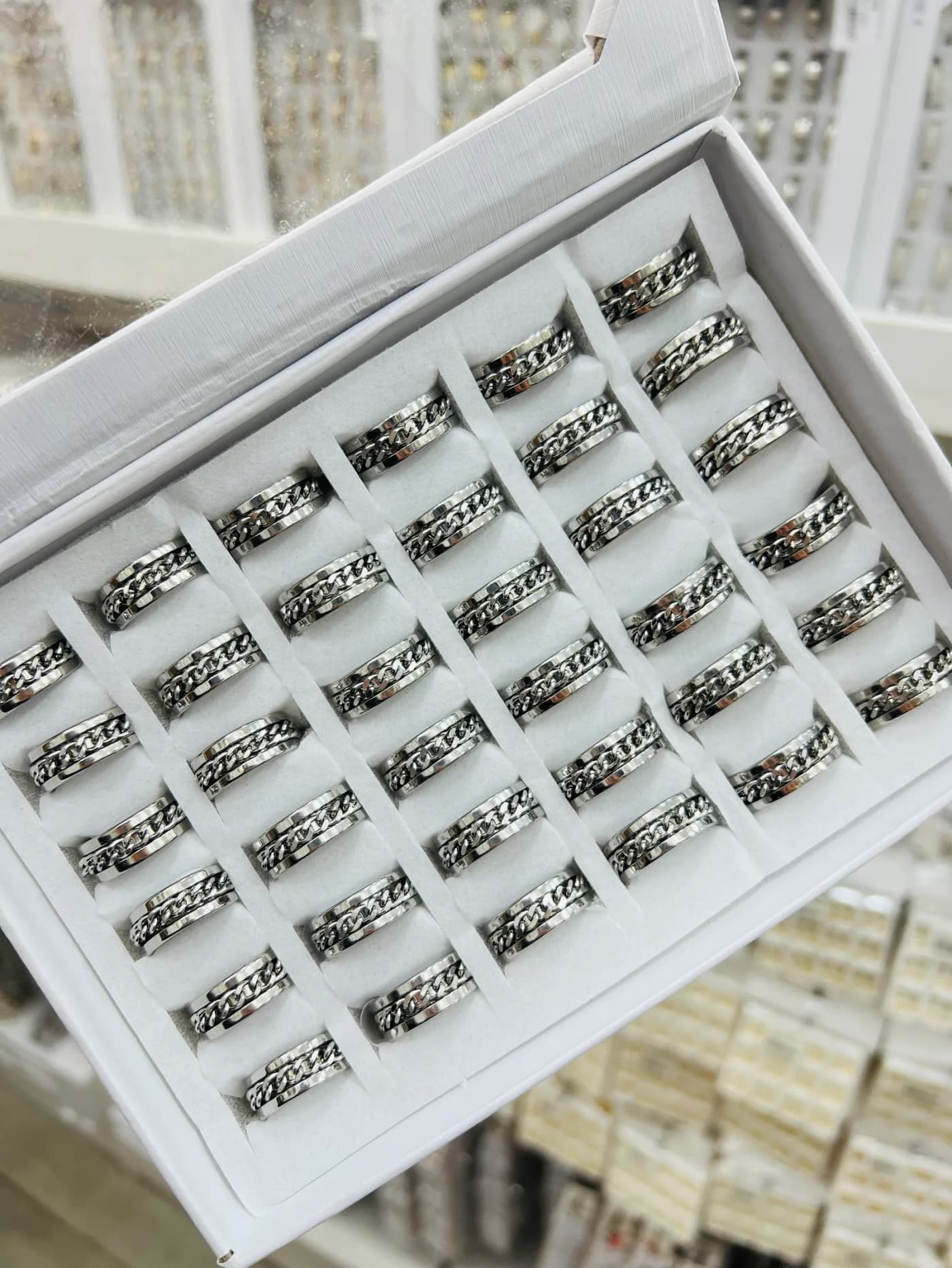 Anillo en caja giratorio