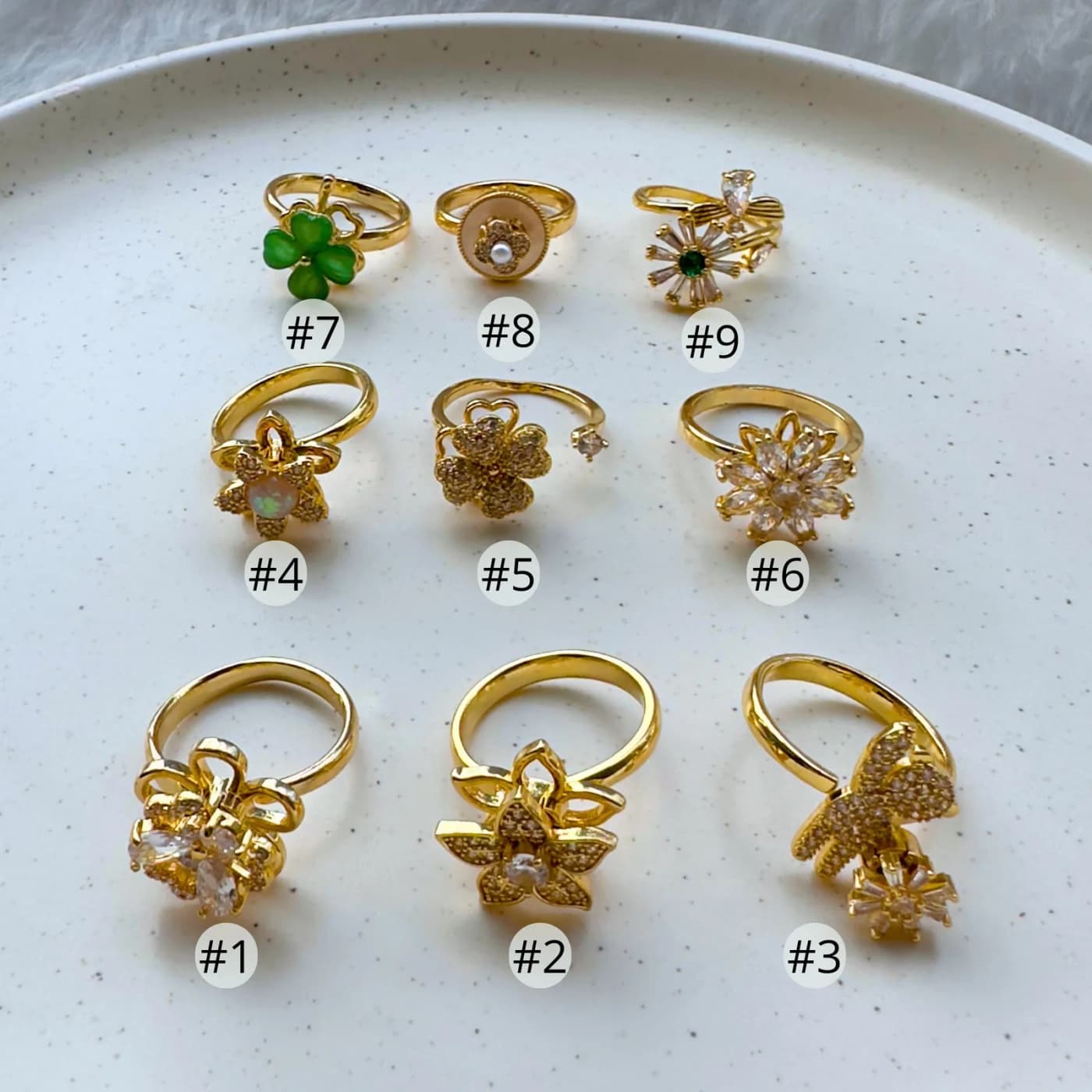 Anillo flor giratorio